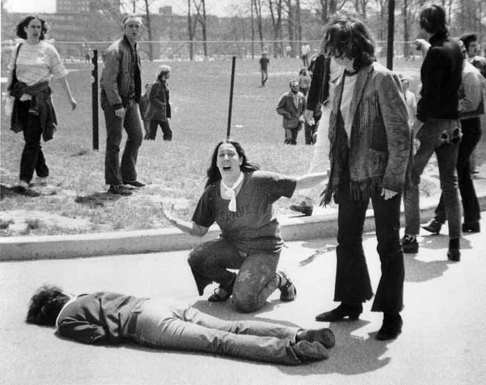 This Pulitzer Prize winning photo by John Filo shows Mary Ann Vecchio screaming as she kneels over the body of student Jeffrey Miller at Kent State University on May 4, 1970. National Guardsmen had fired in to a crowd of demonstrators, killing four and wounding nine.