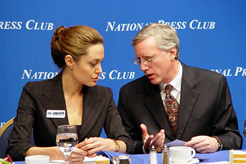 Angelina Jolie speaks with William McCarren