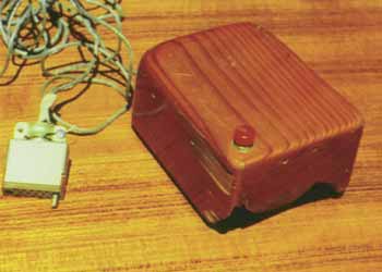 The first mouse was a simple hollowed-out wooden block, with a single push button on top