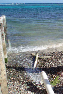 Runoff from this pipe in the U.S. Virgin Islands spews directly into the ocean only a few hundred yards from reefs. Photo courtesy of the NOAA Coastal Programs Division