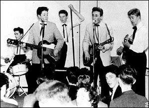  Paul McCartney, aged 15, performs with The Quarry Men, led by John Lennon