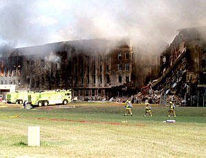 Firefighters struggle to contain the fire, September 11, 2001