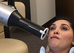 Woman in dentist's chair.